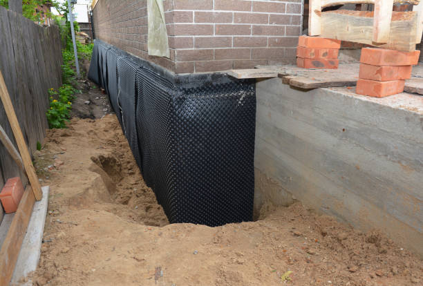 Happy homeowners after waterproofing job in Billingsley